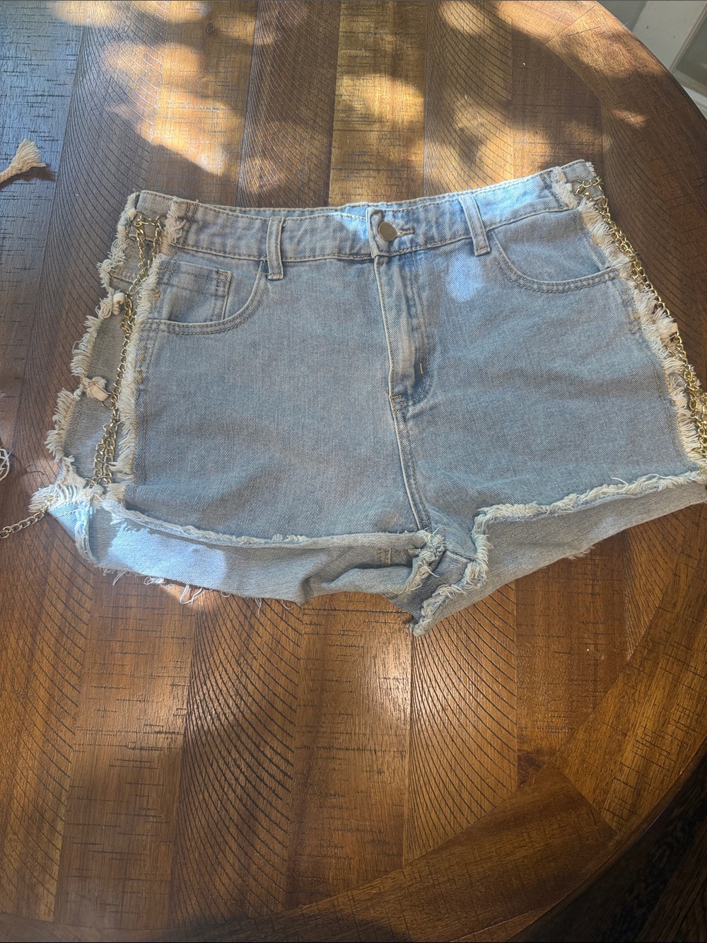 Fashion Nova Distressed Denim Shorts with Open Side Fringe and gold chain